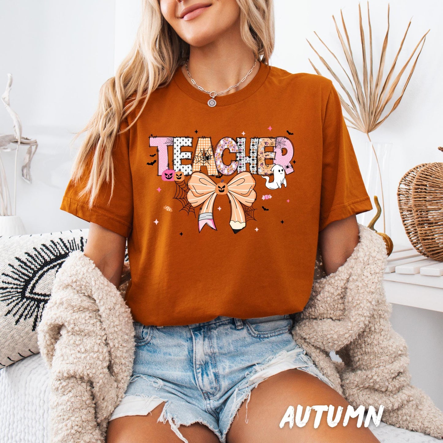 Halloween Teacher Shirt – Cute Teacher Graphic Tee with Pumpkin Bow & Ghosts | Fun Halloween Teacher Outfit | Spooky Teacher Gift Shirt