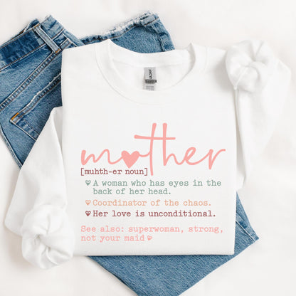sweatshirt with the word "mother" in pink cursive, a heart replacing the "o," and a humorous definition below in mixed fonts and colors, describing a mother’s traits with love and humor.