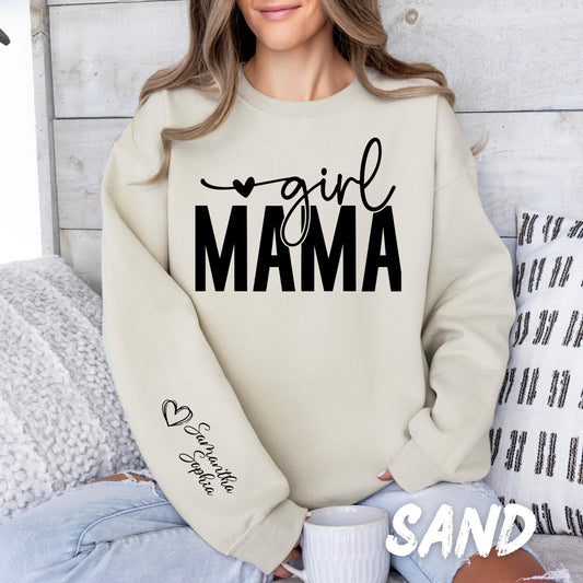 Alt text: A light gray sweatshirt with &quot;girl MAMA&quot; in bold black script. The left sleeve is customizable with a name, currently displaying &quot;Sophia&quot; with a heart design.