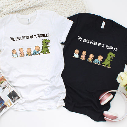 Illustration showing the humorous "evolution" of a toddler, with a sequence of cartoon babies progressing from a swaddled newborn, to sitting, crawling, and walking—ending with the toddler transforming into a roaring green dinosaur, symbolizing their wild and energetic phase.