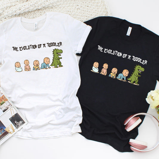 Illustration showing the humorous "evolution" of a toddler, with a sequence of cartoon babies progressing from a swaddled newborn, to sitting, crawling, and walking—ending with the toddler transforming into a roaring green dinosaur, symbolizing their wild and energetic phase.