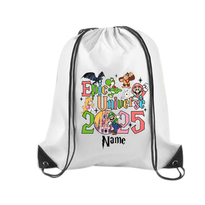 drawstring backpack with colorful 'Epic Universe 2025' design, featuring popular characters like Mario, Luigi, Yoshi, Donkey Kong, and Princess Peach around a castle image. Includes space for custom name personalization. Ideal for Universal Studios trips or themed gifts