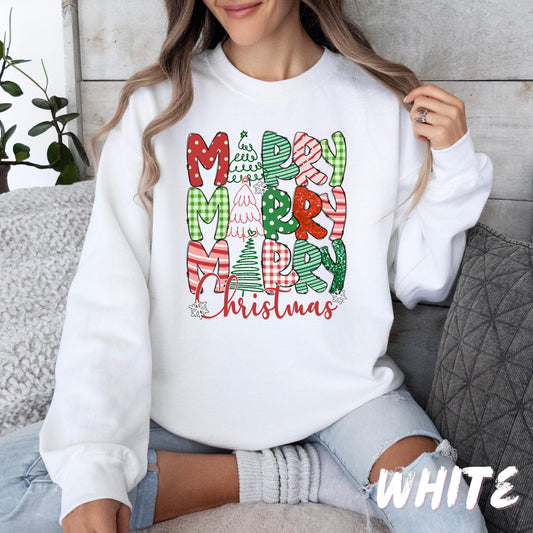 A cozy white sweatshirt featuring the phrase &quot;Merry Merry Merry Christmas&quot; in festive fonts and patterns with Christmas trees and snowflakes.