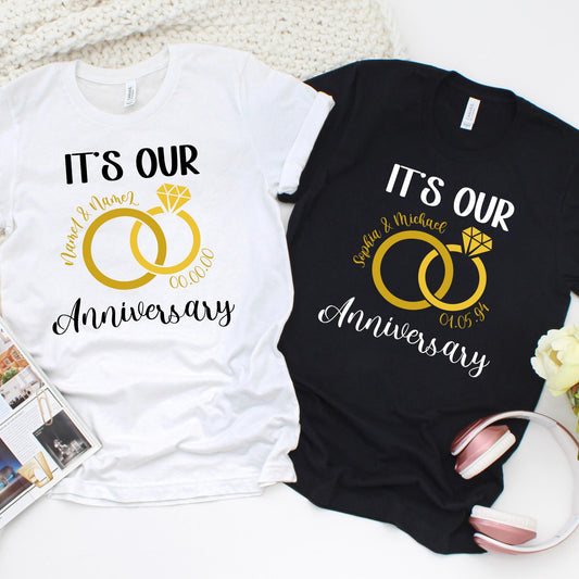 Custom anniversary shirt with gold wedding rings design and personalized names.

Personalized couples anniversary t-shirt with rings and custom date.

Wedding anniversary shirt with gold rings, names, and special date.

Custom couple gift shirt, “It’s Our Anniversary” with rings and names.

Personalized anniversary tee with diamond ring graphic and custom details.