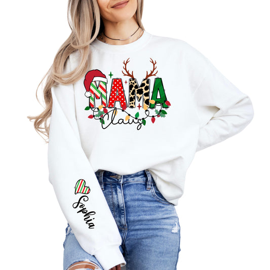 “Mama Claus” Christmas sweatshirt featuring festive holiday lettering with Santa hat, leopard print, reindeer antlers, and Christmas lights. Personalized with children’s names and cute heart icons on the sleeve. Perfect custom holiday sweatshirt gift for moms who love Christmas and family matching outfits.