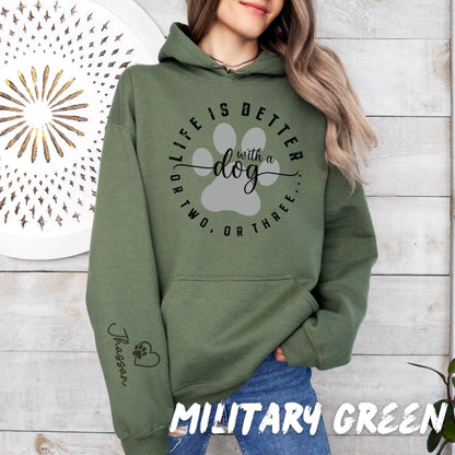 Custom dog lover hoodie with minimalist paw design and pet name printed on sleeve