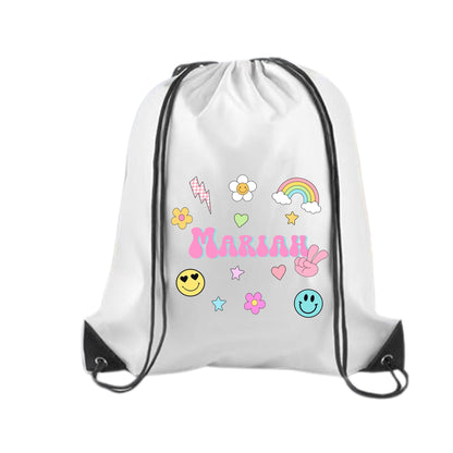 Custom name drawstring backpack featuring colorful retro-style graphics including smiley faces, rainbow, flowers, hearts, stars, and lightning bolt. Personalized with the name “Samantha” in bold pastel bubble letters. Lightweight black gym bag made with durable material and vibrant DTF print, perfect for kids, travel, school, cruise gifts, or matching family outfits. Spacious size ideal for carrying snacks, toys, and daily essentials.