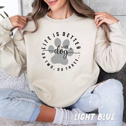 Custom dog owner gift hoodie with paw design and personalized dog name on sleeve