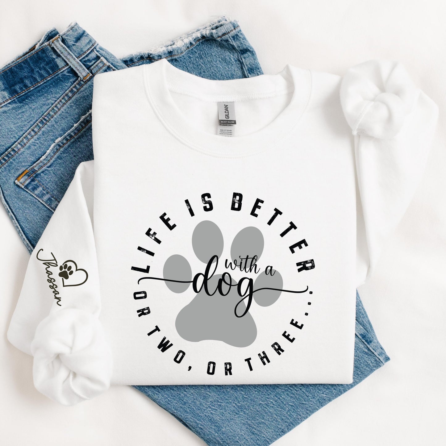 White dog lover sweatshirt with “Life is Better with a Dog” design and custom pet name on sleeve