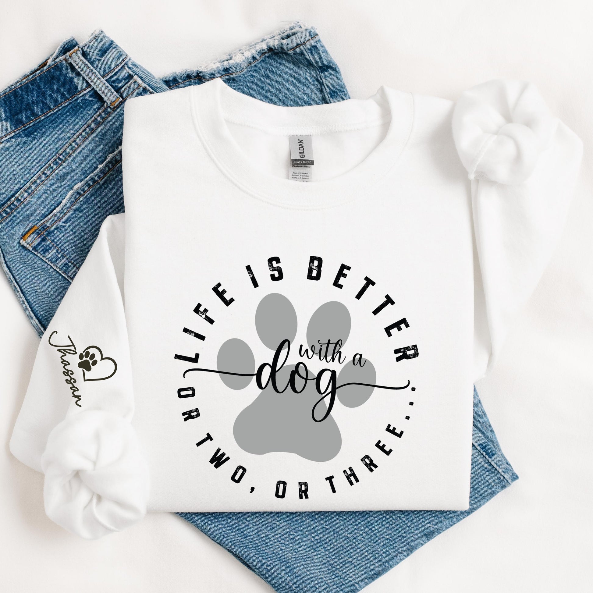 White dog lover sweatshirt with “Life is Better with a Dog” design and custom pet name on sleeve