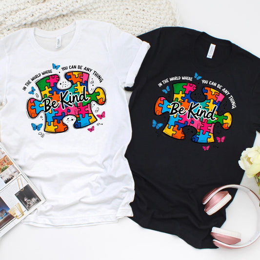 Autism awareness Be Kind shirt with colorful puzzle piece design and butterflies