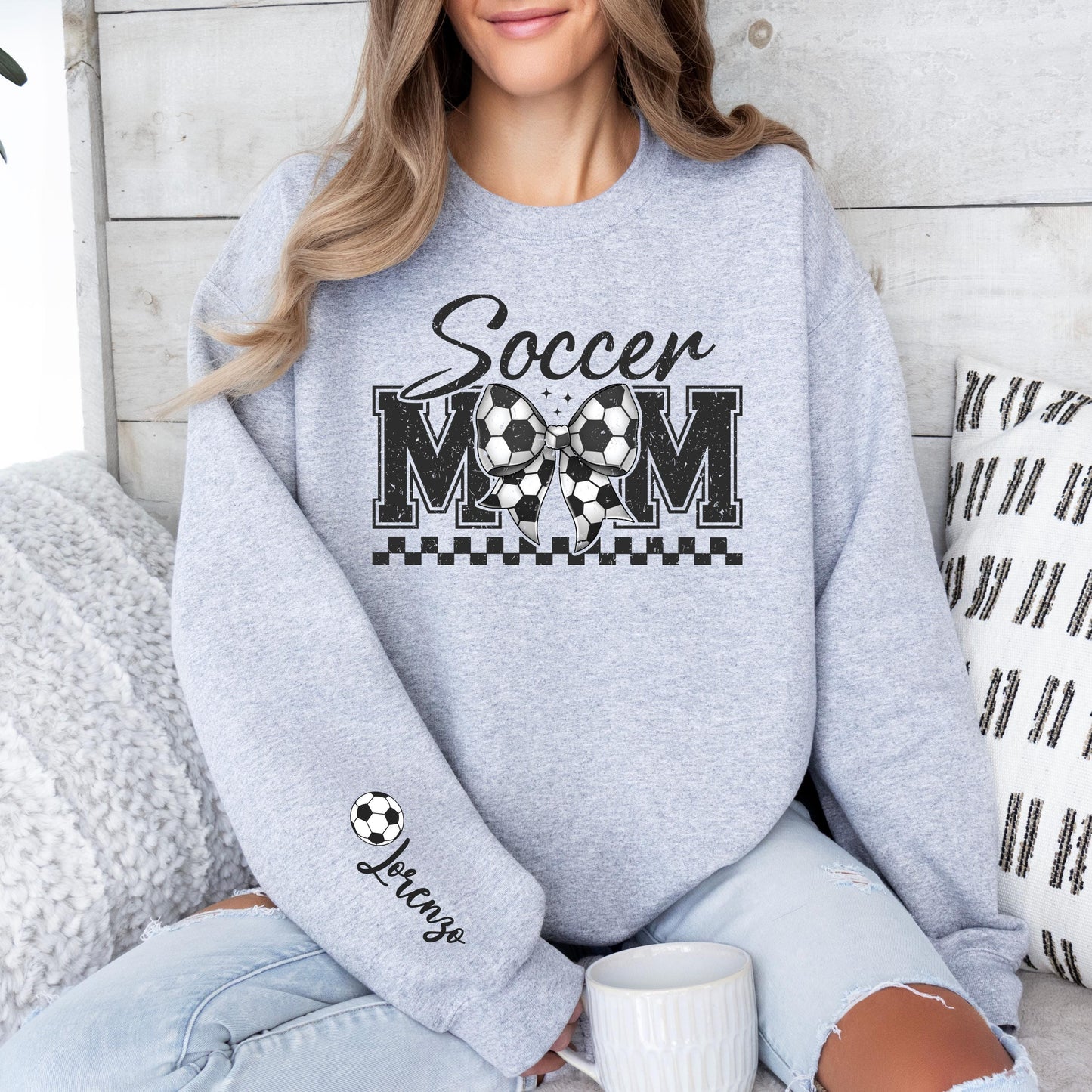 Sport gray Soccer Mom crewneck customized with a player name.