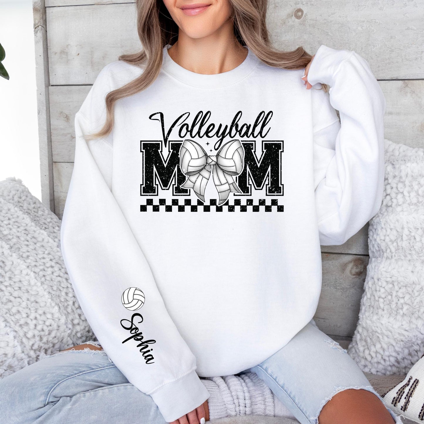 Beige volleyball mom crewneck featuring varsity MOM lettering and customizable sleeve.