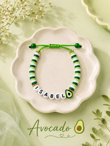 Collection of colorful personalized friendship bracelets with fruit charms.