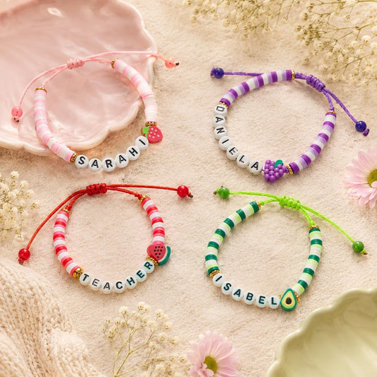 Personalized clay bead bracelet with custom name and fruit charm, adjustable handmade bracelet.