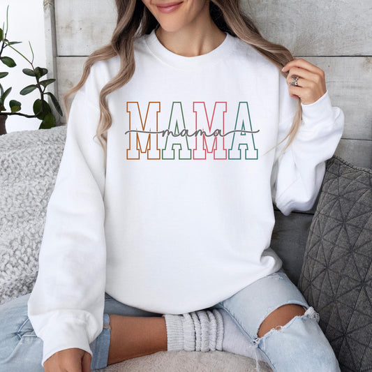 Woman wearing a white Gildan crewneck sweatshirt featuring a pastel varsity-style "Mama" graphic, perfect for Mother's Day, new moms, and everyday casual wear.
