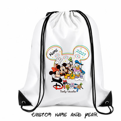 A drawstring backpack featuring a Disney-themed design. The design includes a Mickey Mouse-shaped graphic with fireworks, a silhouette of a Disney castle, and popular Disney characters such as Mickey Mouse, Minnie Mouse, Donald Duck, Daisy Duck, Goofy, and Pluto. The text "Sophia 202?" is written inside one of the ears of the Mickey Mouse shape, and "Disney Trip" is written in a playful font along the side. The backpack has black drawstrings and reinforced black corners.