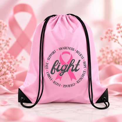 Light pink drawstring backpack with breast cancer awareness ribbon and Fight design surrounded by words including support, awareness, believe, hope, strength, courage, faith, family and love.